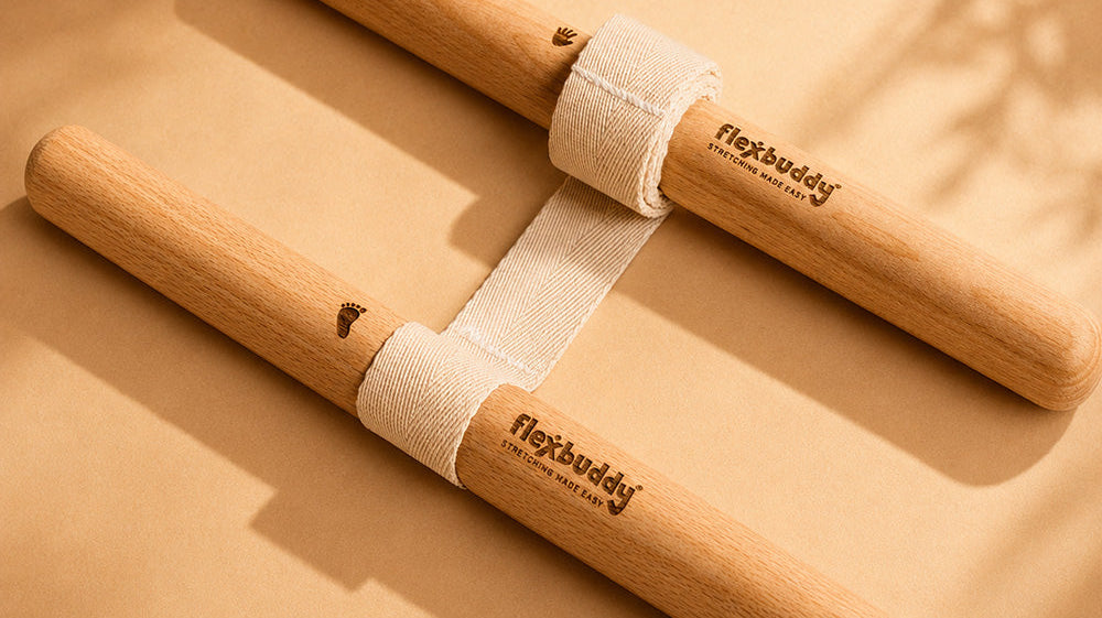 Improving flexibility at home with the FlexBuddy stretching tool — supported stretching on the living room floor